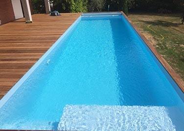 Piscine 12x3 en bois avec escalier-plage en kit